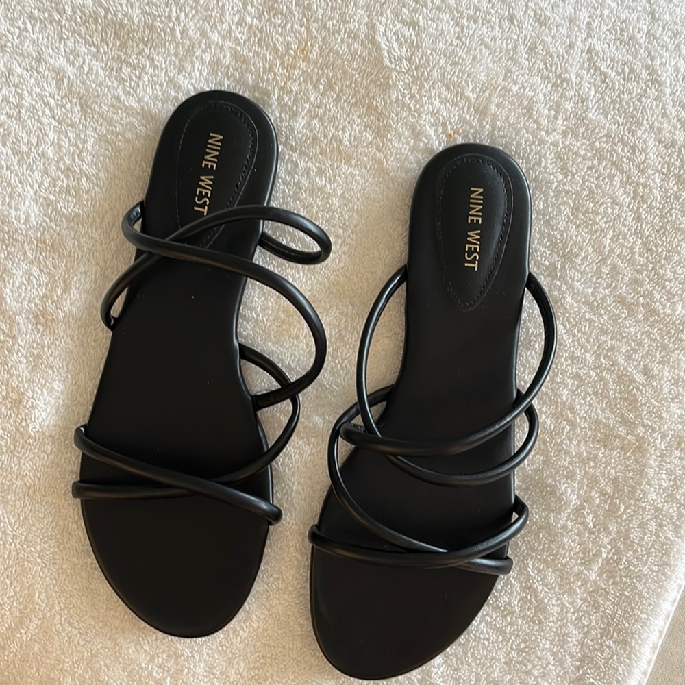 Nine West size 12 black faux leather slip on sandals - never worn